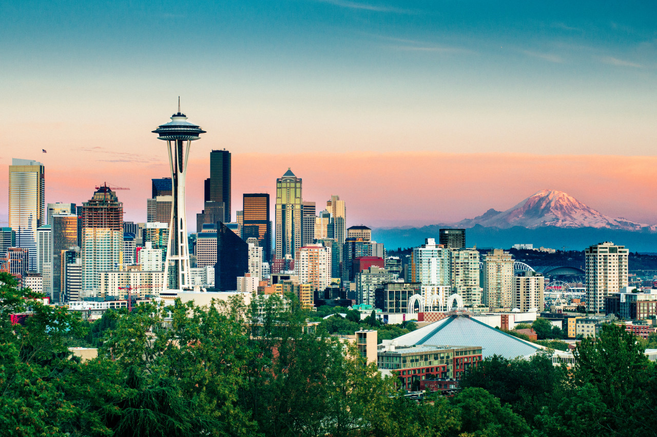 Seattle Skyline and Mount Rainier at Sunset on a clear summer day.